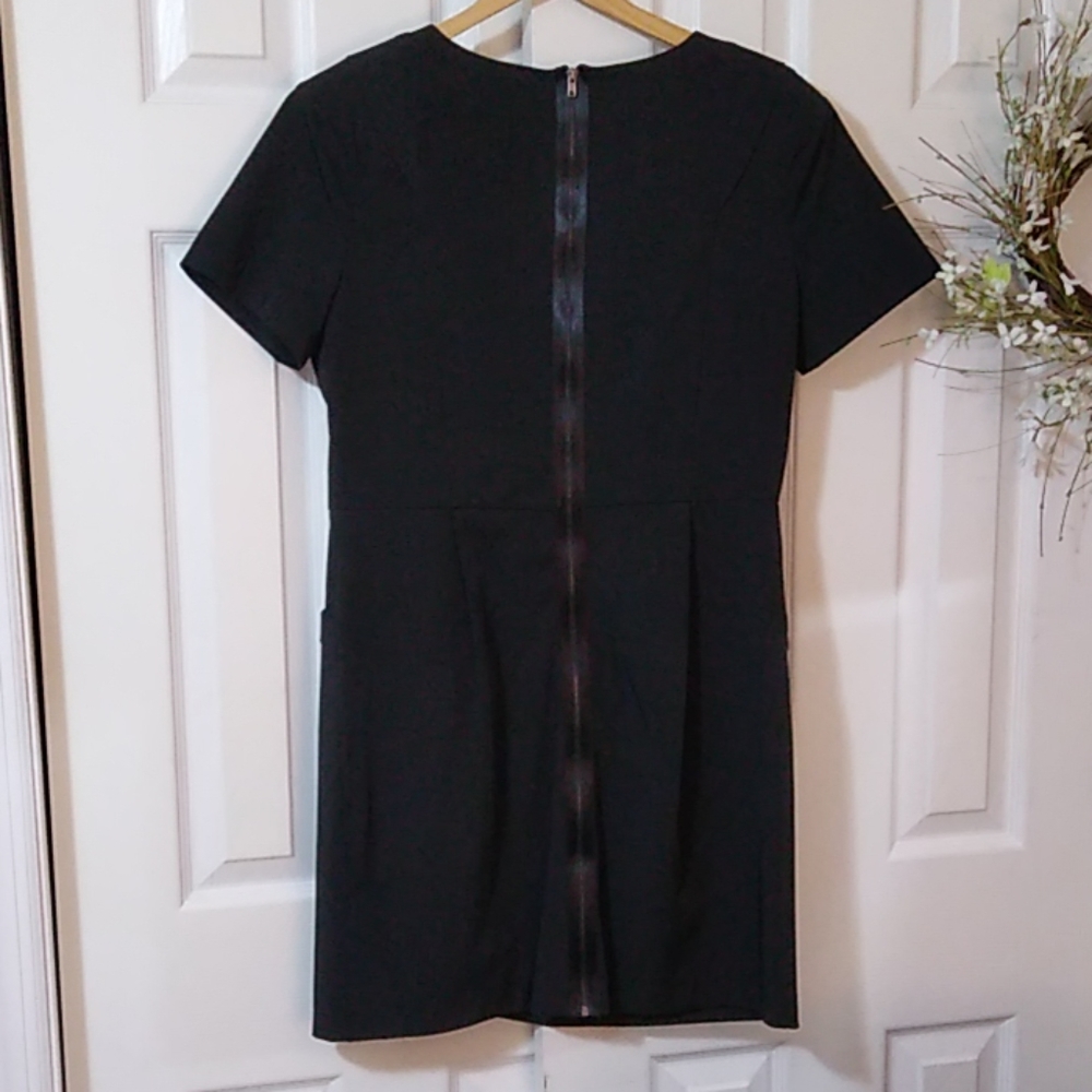 Gorgeous black dress with padded shoulders